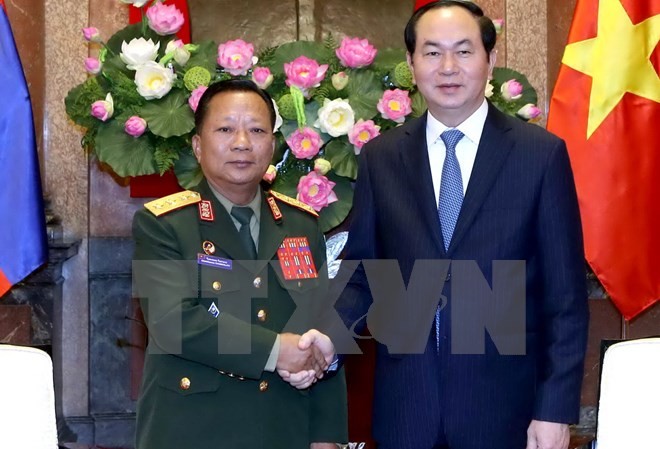 Chủ tịch nước Trần Đại Quang tiếp Bộ trưởng Quốc phòng Lào và Phó Chủ tịch Hội đồng Nhà nước Cuba - ảnh 1